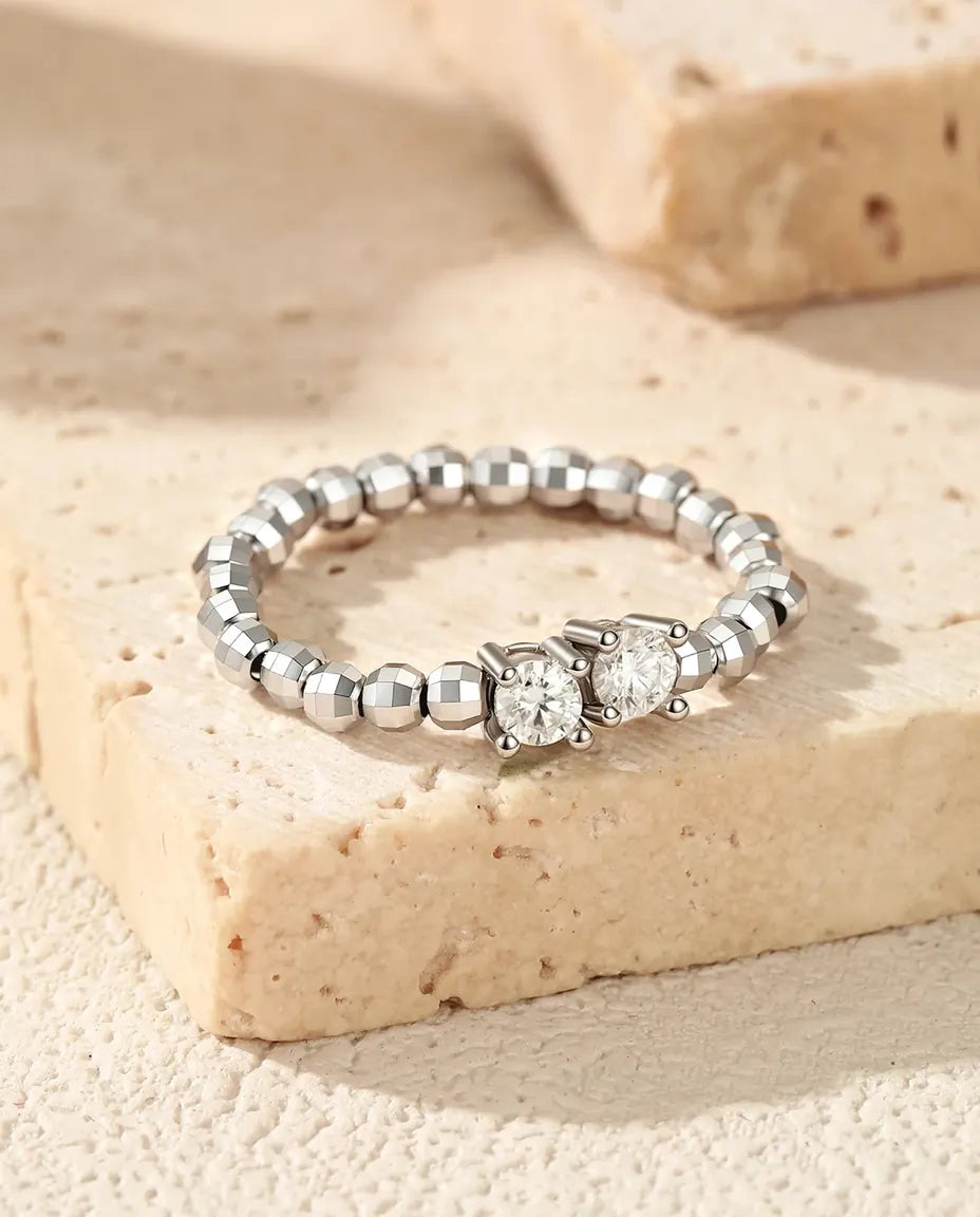 Adjustable beaded moissanite ring in 925 sterling silver with two round D color stones