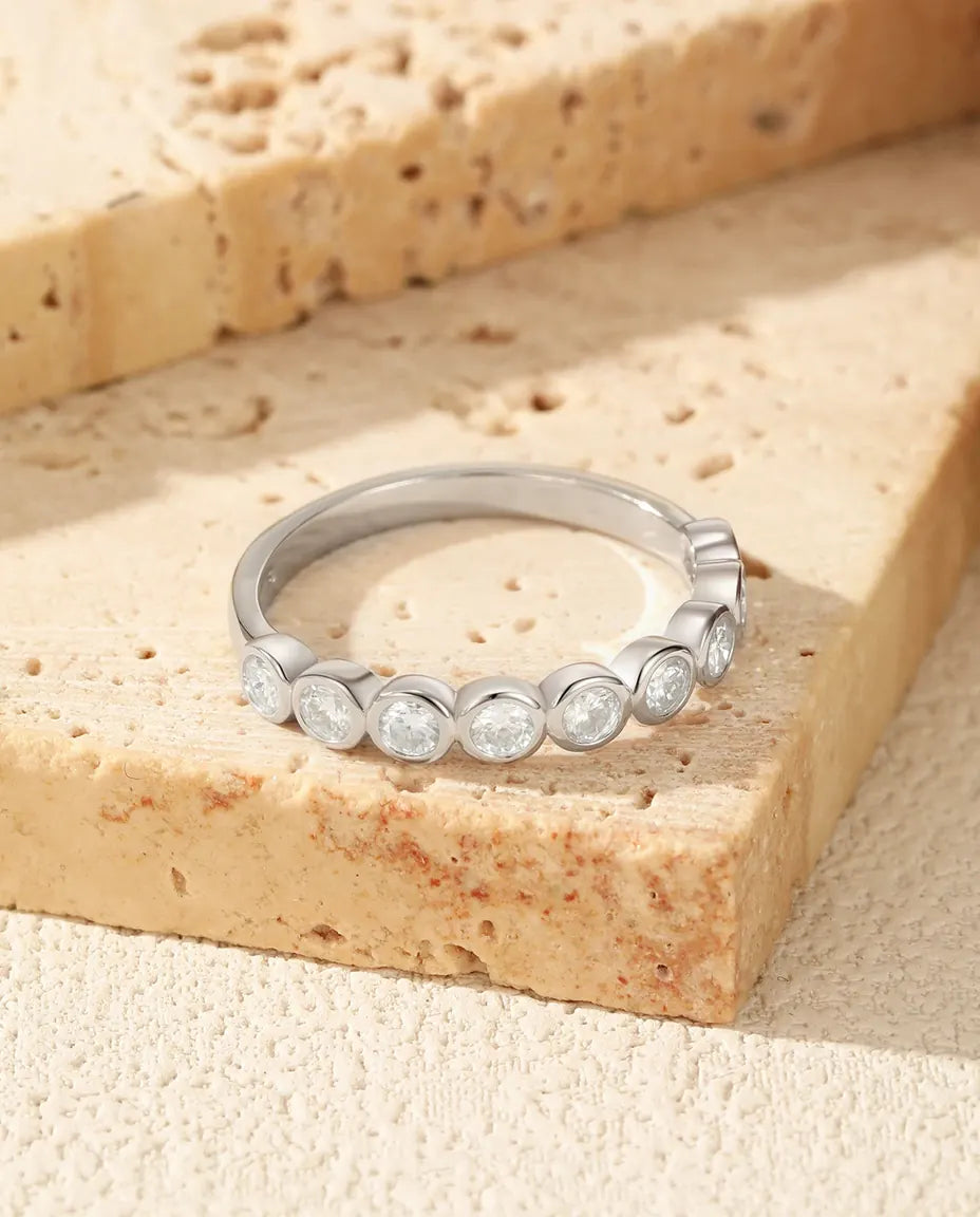 Bezel-set moissanite eternity ring in 925 sterling silver, bubble band