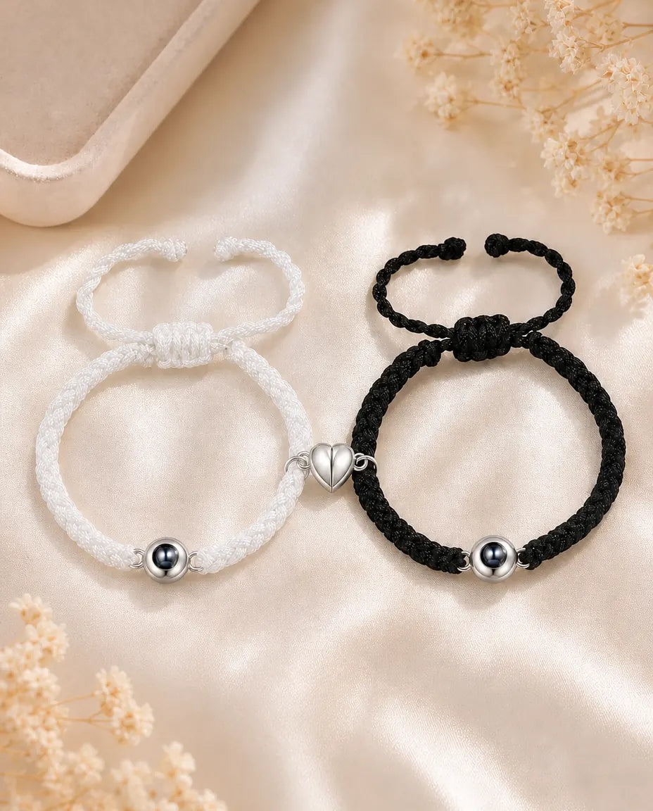Matching couple bracelets set of two with photo projection beads and magnetic half hearts on cream silk