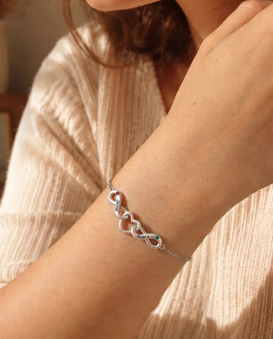 Personalized Infinity Bracelet With 2 Names - Double Infinity and Heart With Two Simulated Birthstones - worn on a model