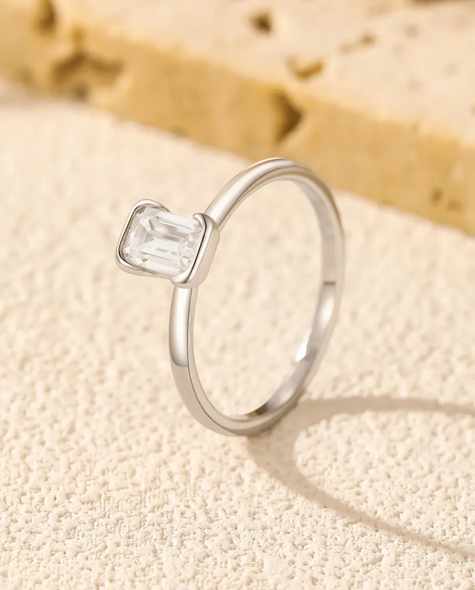 Emerald cut moissanite engagement ring in 925 sterling silver