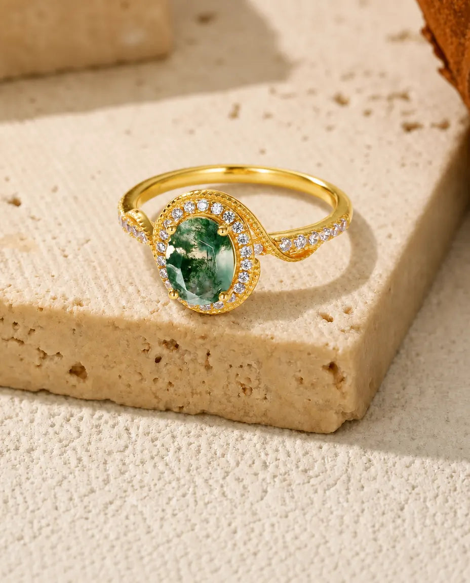 Gold moss agate oval halo ring in 10K gold-plated sterling silver with milgrain frame and twisted pave shoulder