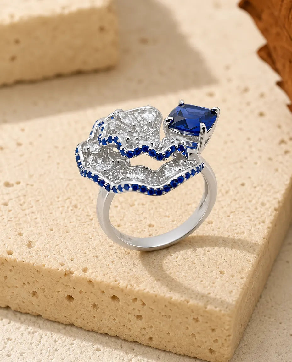 Lab sapphire fan statement open ring in sterling silver with pave fan and cushion stone