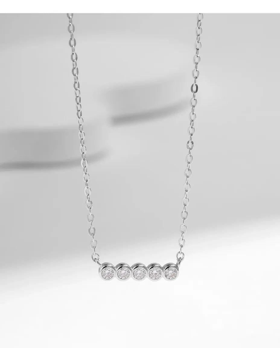 Moissanite bar necklace in 925 sterling silver, five D color bezel-set stones, curved pendant for women