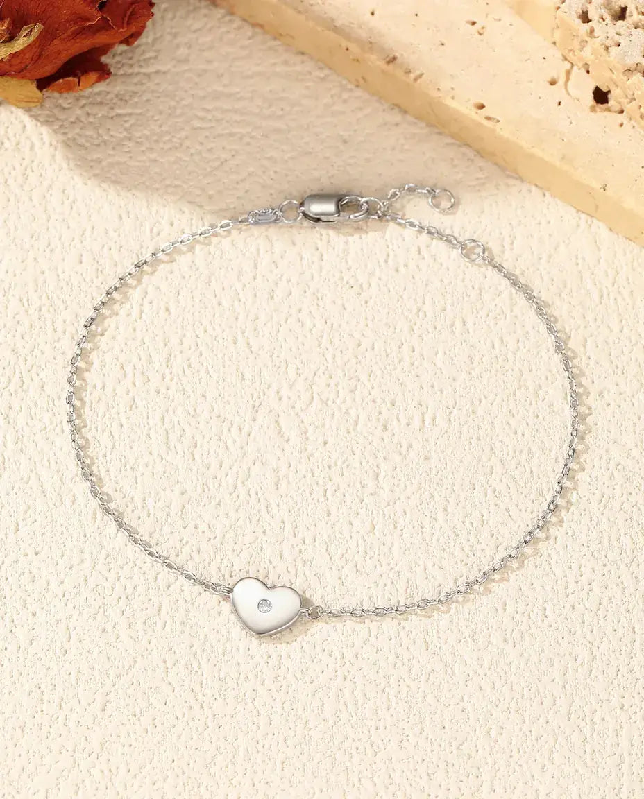 Moissanite heart charm bracelet in 925 sterling silver