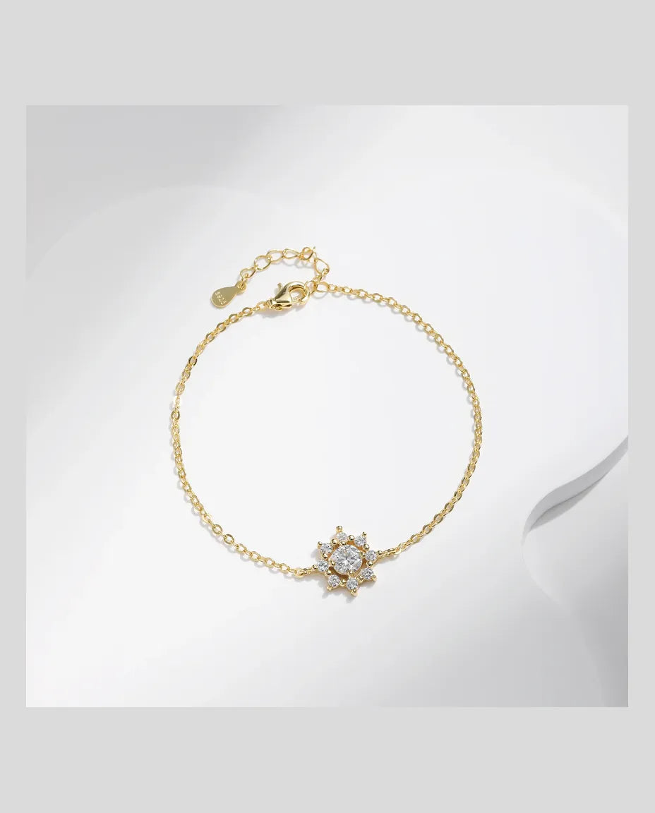 Gold-plated moissanite snowflake charm bracelet in 925 sterling silver