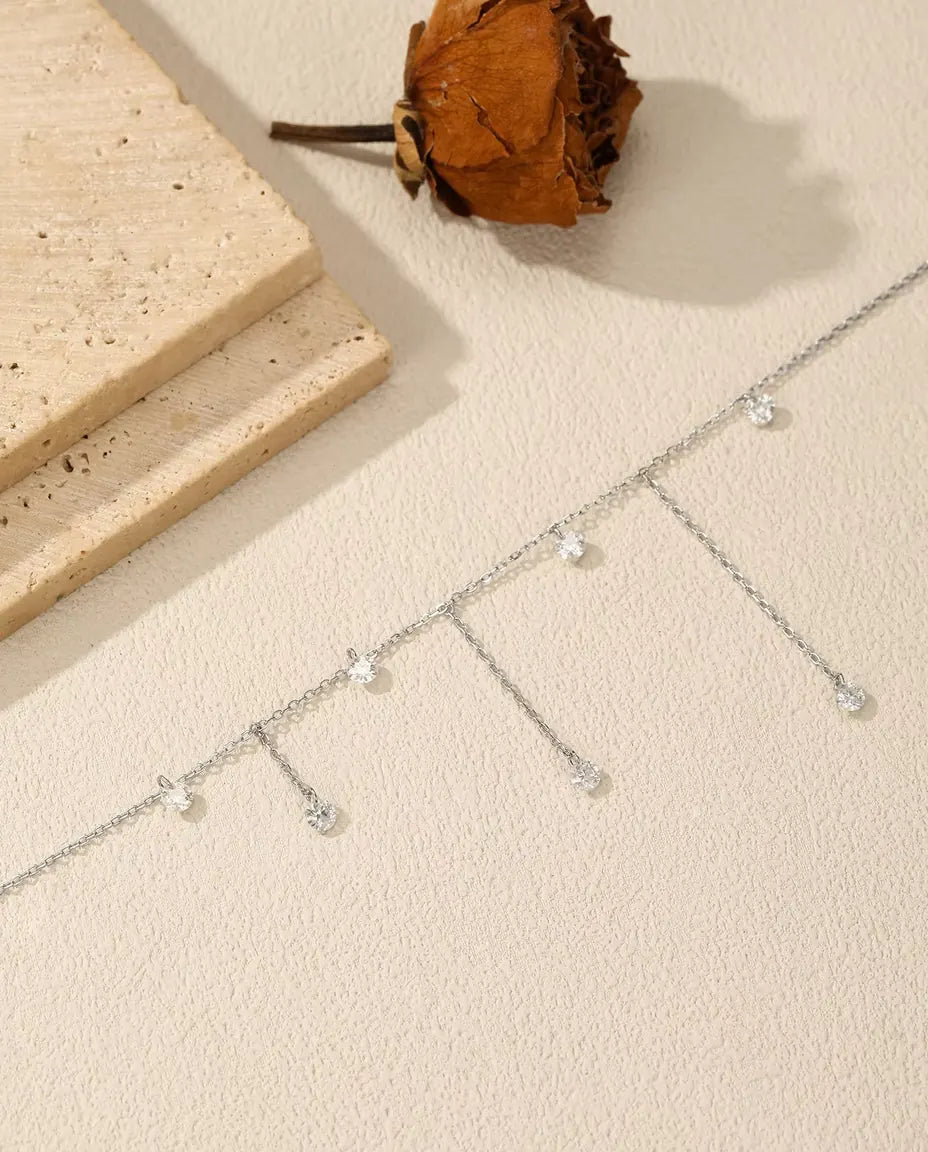 Moissanite Station Necklace - Seven 0.30 ct 4 mm Round Stones on a Staggered Chain, 925 Sterling Silver