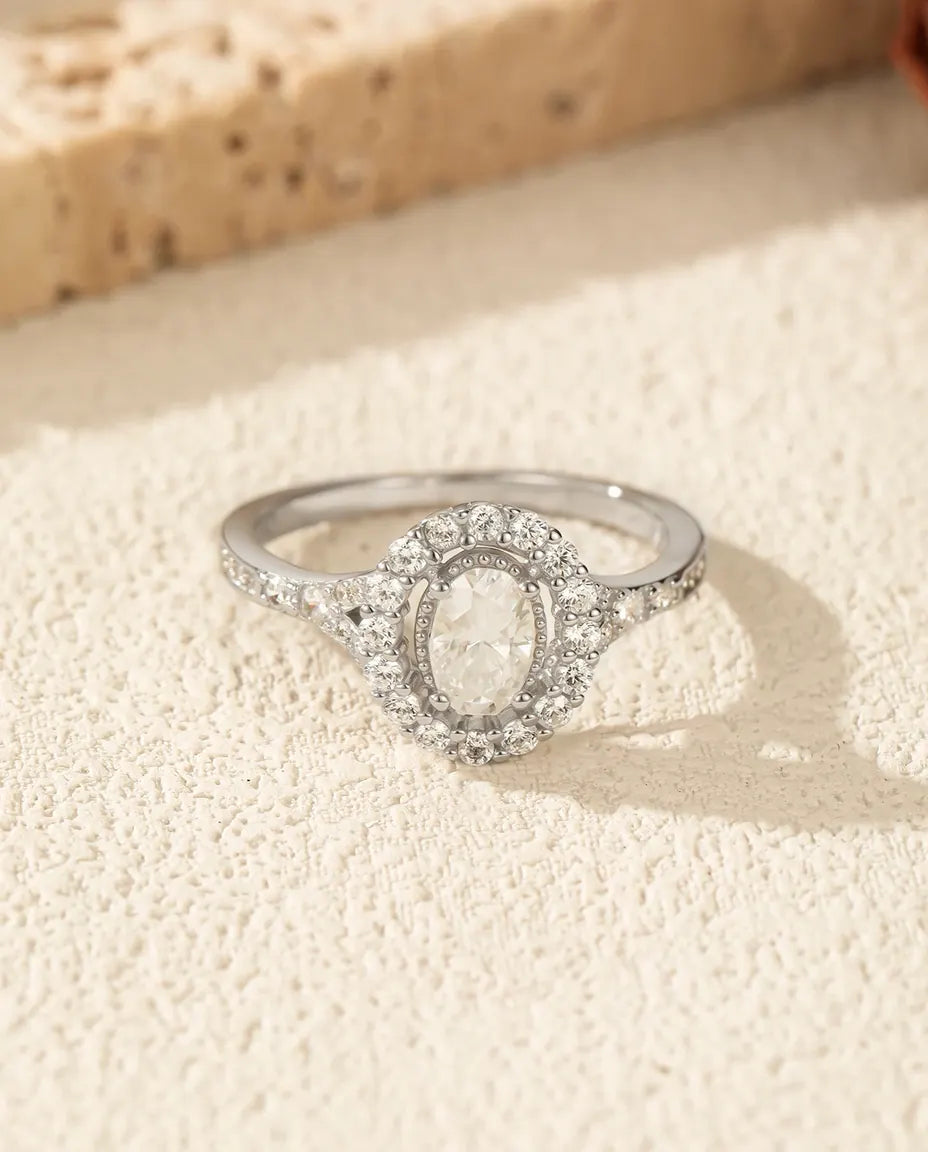 Oval halo moissanite engagement ring in 925 sterling silver