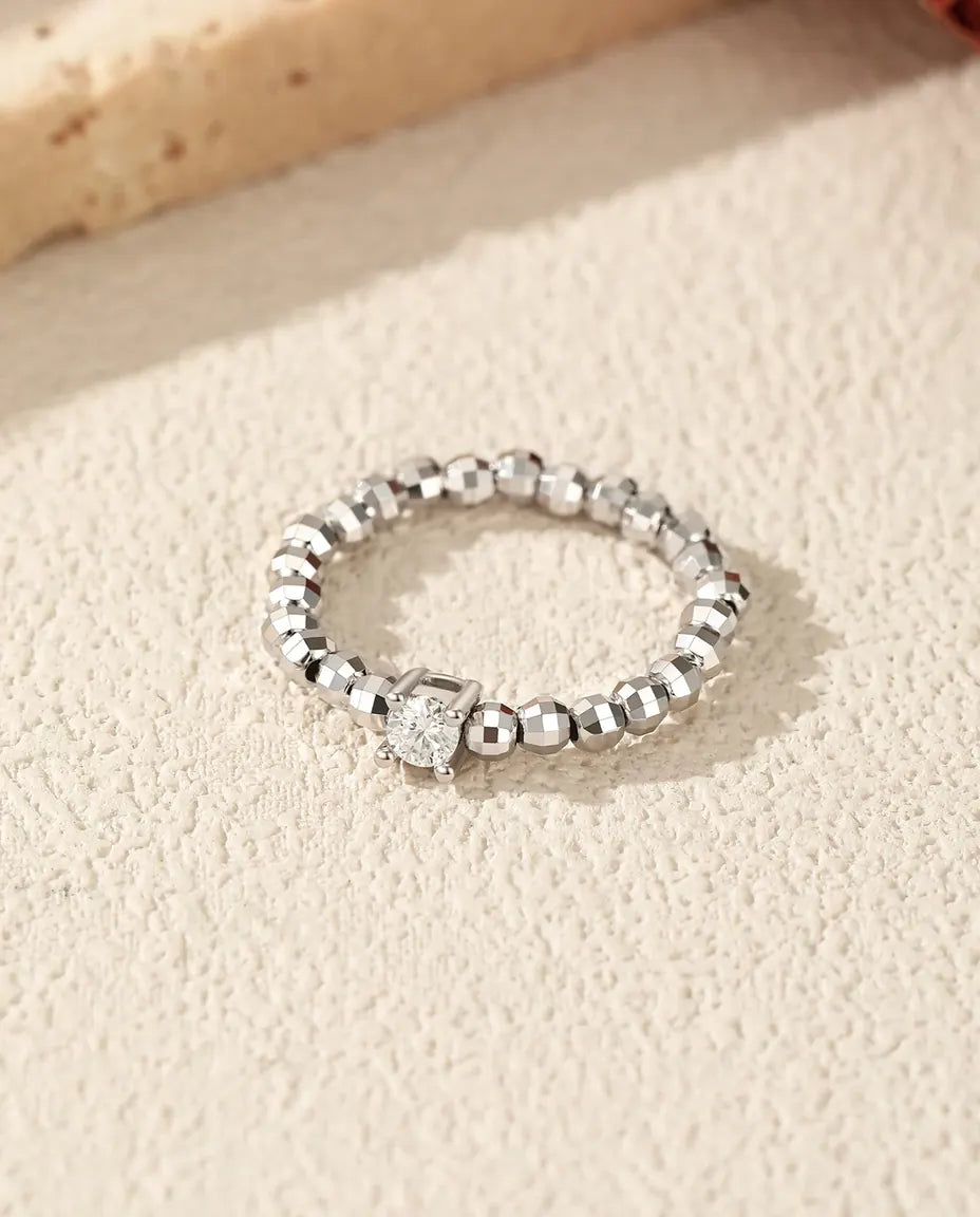 Teardrop moissanite ring on adjustable beaded sterling silver band