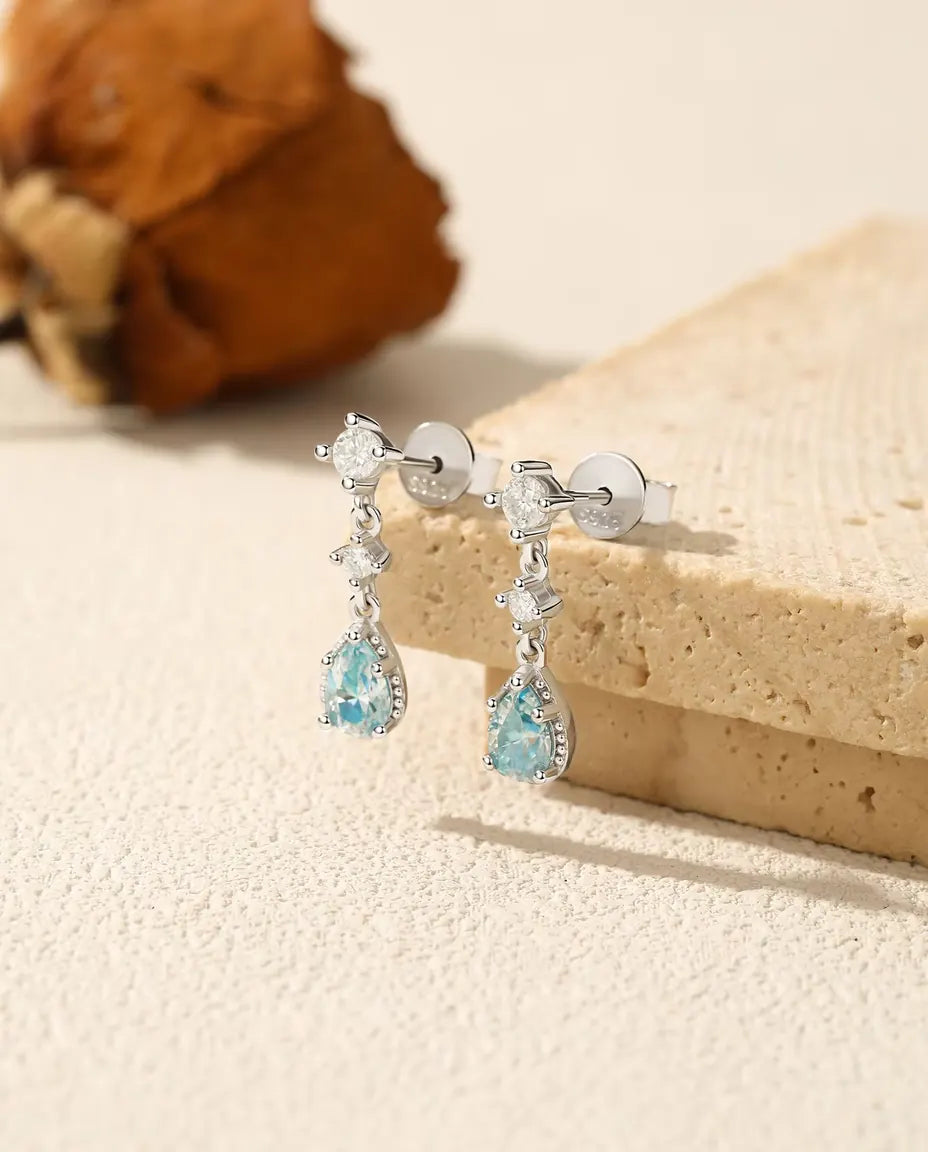Aqua Blue Moissanite Drop Earrings - 0.50 ct 4 x 6 mm Pear Stone per Earring with Cubic Zirconia Accents, 925 Sterling Silver
