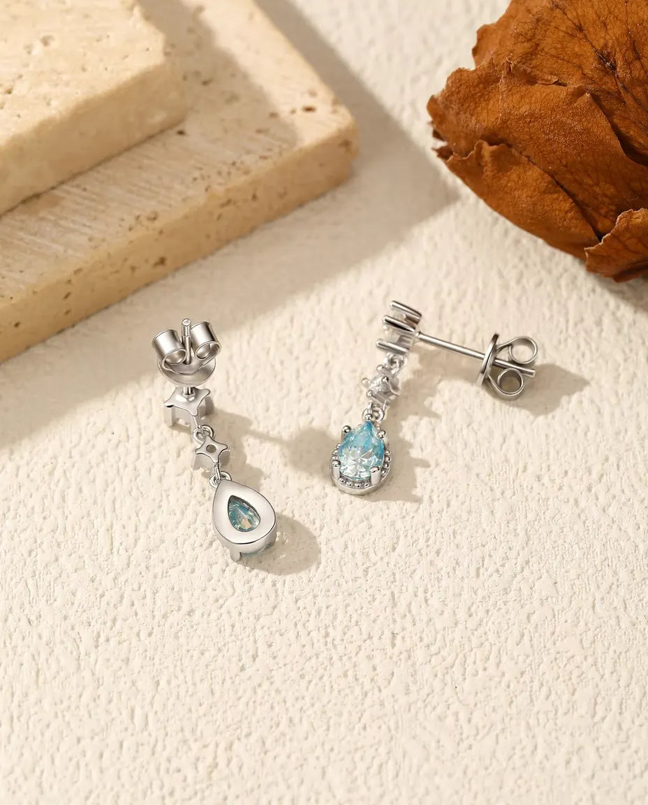 Aqua Blue Moissanite Drop Earrings - 0.50 ct 4 x 6 mm Pear Stone per Earring with Cubic Zirconia Accents, 925 Sterling Silver