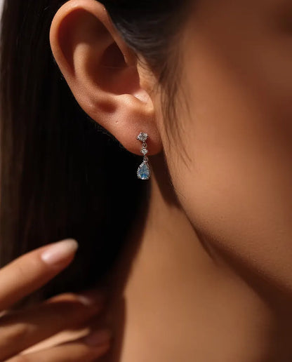 Aqua Blue Moissanite Drop Earrings - 0.50 ct 4 x 6 mm Pear Stone per Earring with Cubic Zirconia Accents, 925 Sterling Silver
