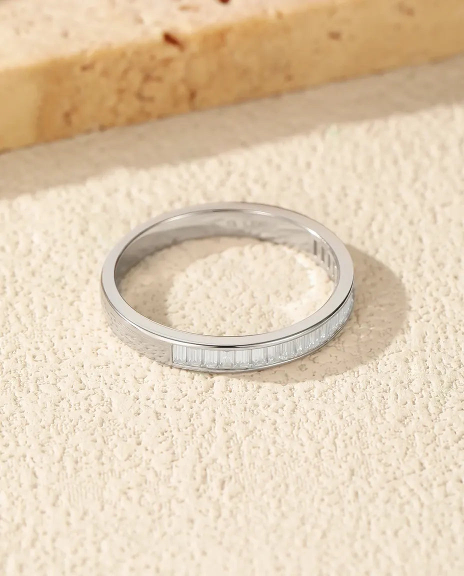 Channel-set baguette moissanite eternity band in 925 sterling silver