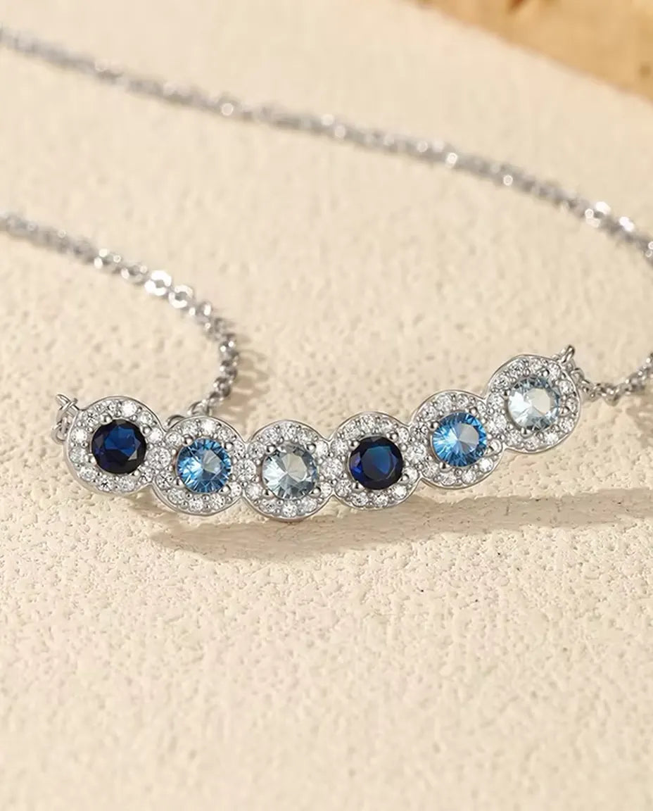 Blue Ombre Bar Necklace - Six Halo Set Blue Stones on a 34 mm Curved Bar, 925 Sterling Silver, 40 + 5 cm