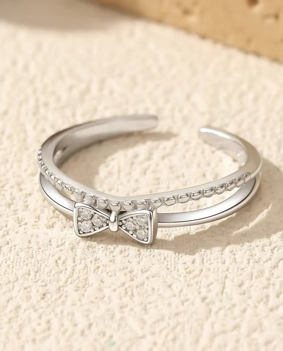 Cubic Zirconia Bow Ring - Pave 3.5 x 7 mm Bow on a Double Band with a Beaded Wire, Adjustable 925 Sterling Silver, US 6 to 9