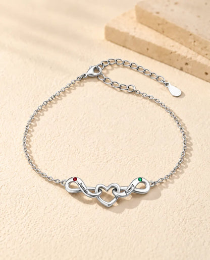 Personalized Infinity Bracelet With 2 Names - Double Infinity and Heart With Two Simulated Birthstones - front view