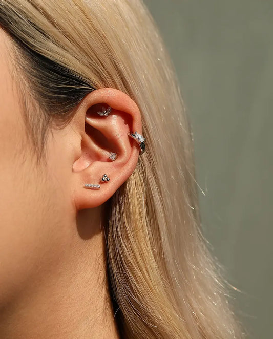 Moissanite Bar Stud Earrings in 925 Sterling Silver - worn together with other studs in the same ear