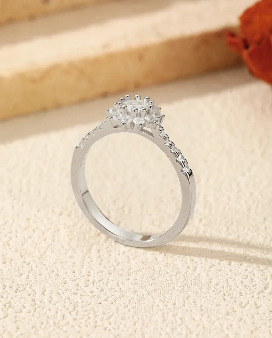 Flower halo moissanite engagement ring in 925 sterling silver with sunburst halo
