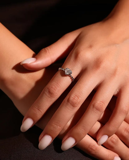 Heart Moissanite Ring in 925 Sterling Silver - worn on a model’s hand