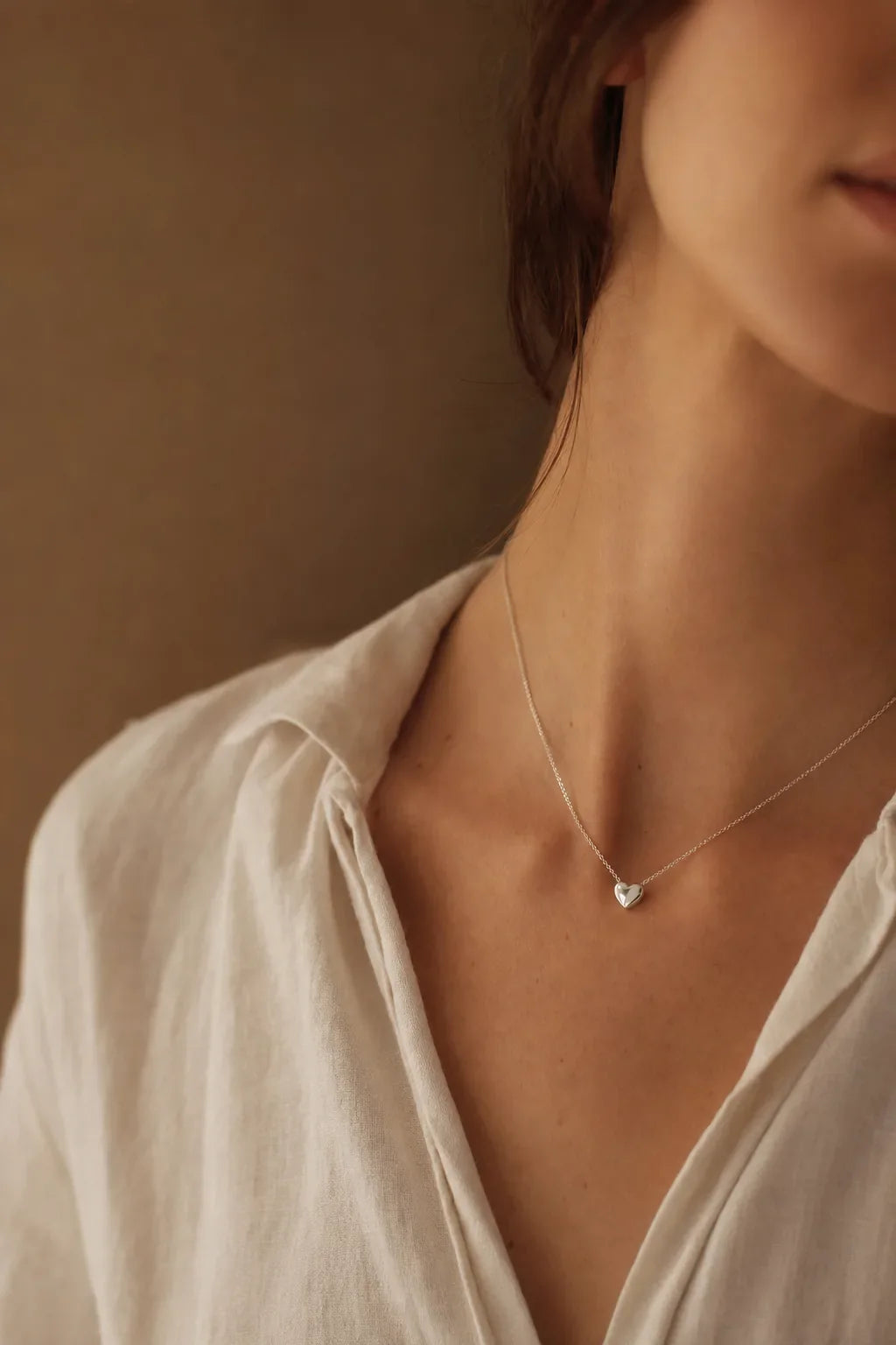 IfShe personalized silver heart pendant necklace worn close to the heart