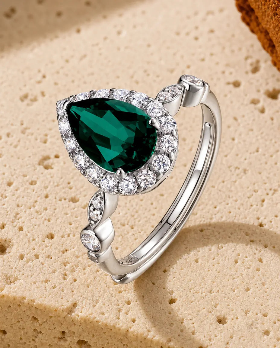 Lab emerald pear halo adjustable ring in sterling silver with vintage marquise and bezel band