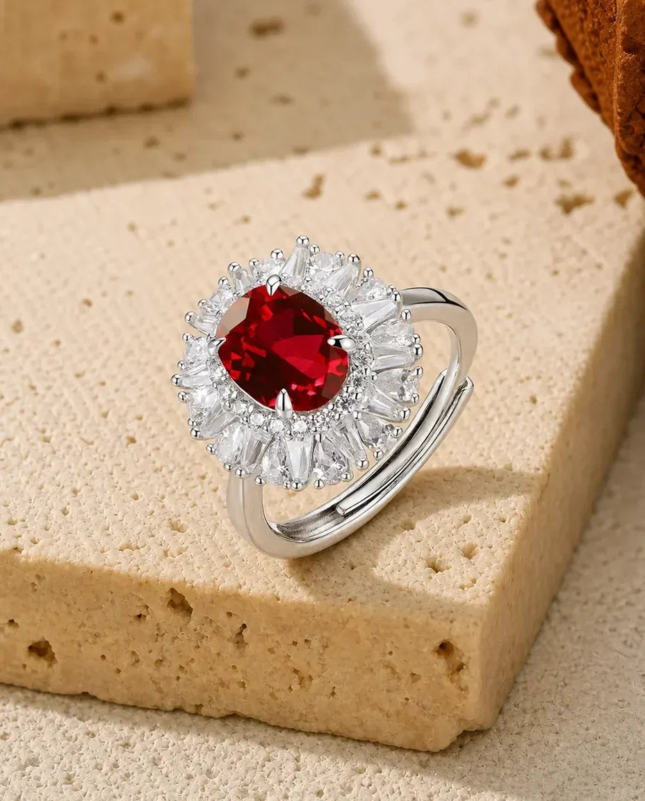 Lab ruby oval halo adjustable ring in sterling silver with radiating baguette halo