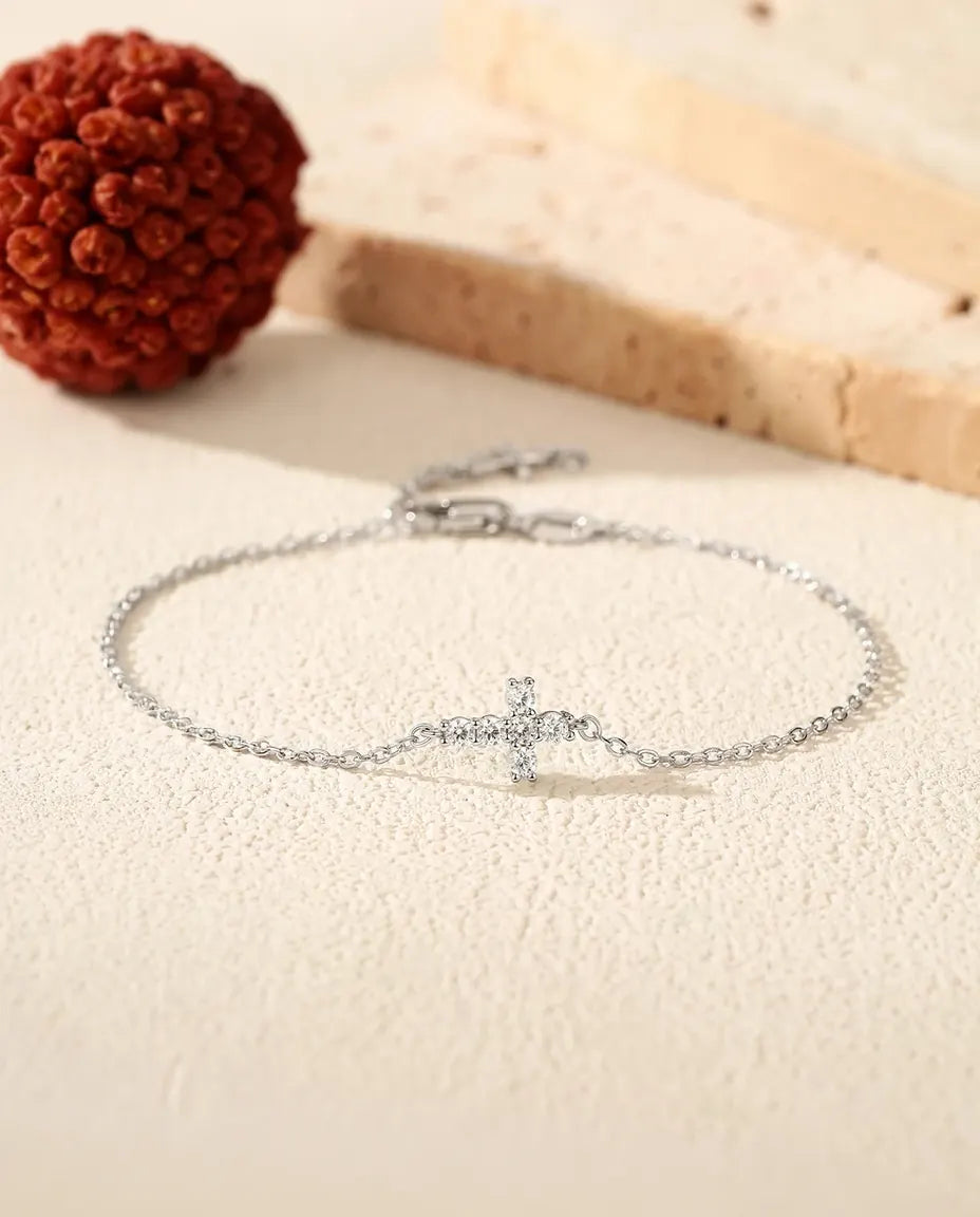 Moissanite cross charm bracelet in 925 sterling silver