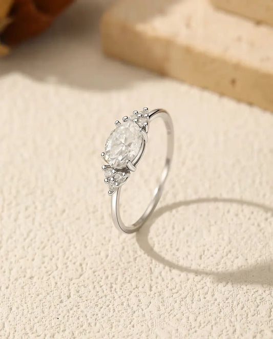 Oval Moissanite Engagement Ring - 1 Carat D Color VVS Solitaire in 925 Sterling Silver, Zirconia Side Clusters, Sizes 5-9