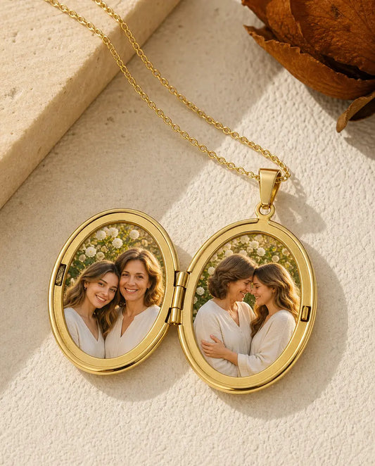 Gold oval locket necklace open showing two photos of mother and daughter inside