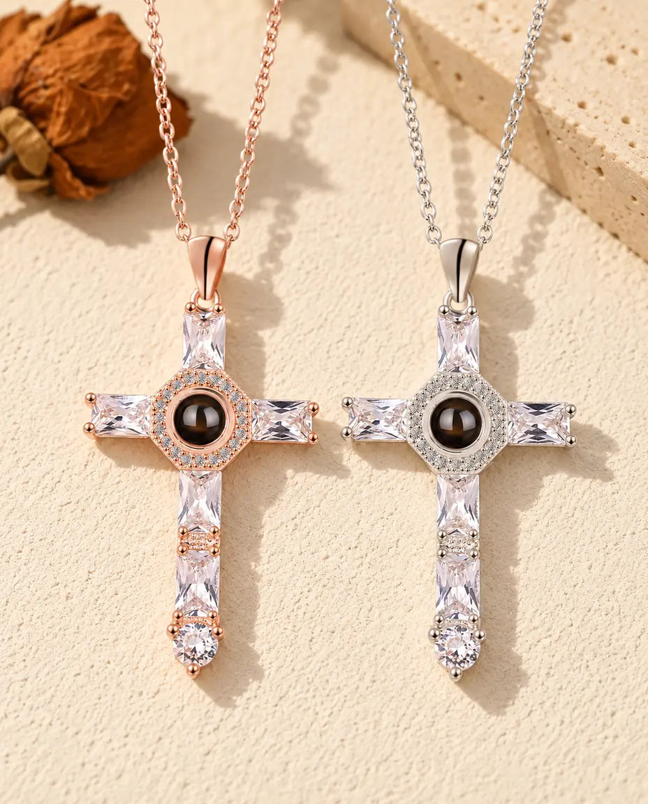 Front view of the rose gold tone and silver tone crosses side by side