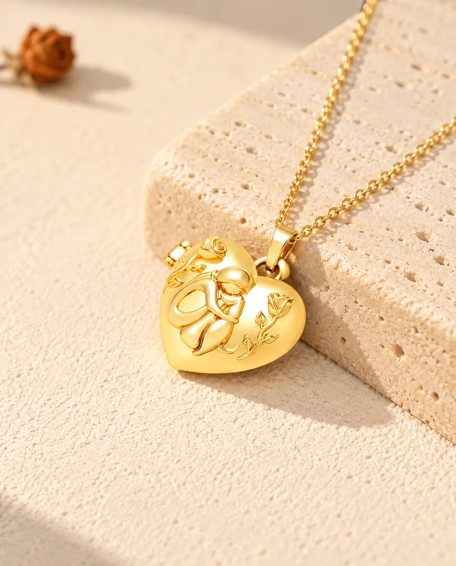 Gold tone heart photo locket necklace with a woman hugging her dog, resting on a travertine block
