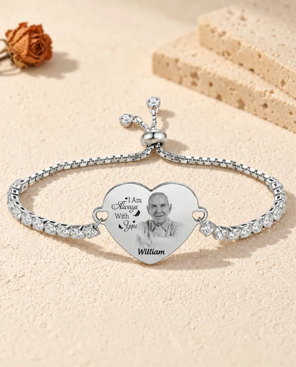 Personalized heart photo tennis bracelet in silver tone engraved with a portrait, message and name