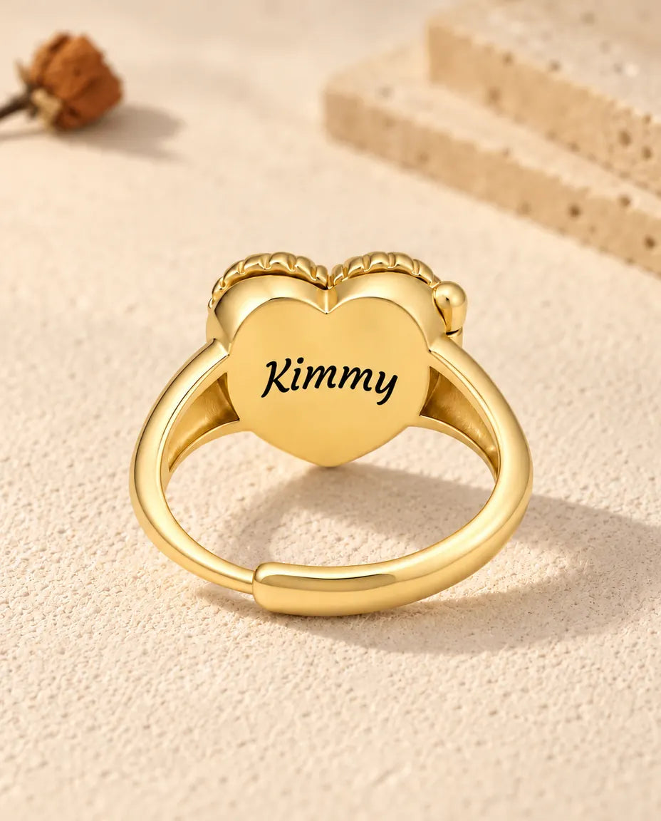 Back of the heart locket ring engraved with the name Kimmy