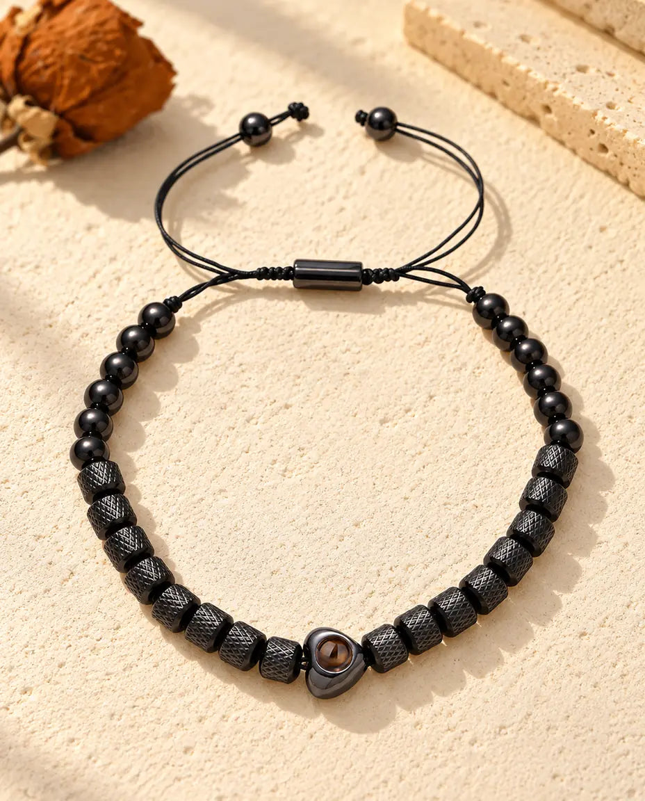Black unisex heart projection bracelet with knurled barrel beads and round beads