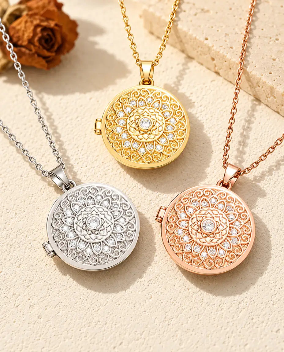Three colors of the mandala flower photo locket necklace arranged on plaster
