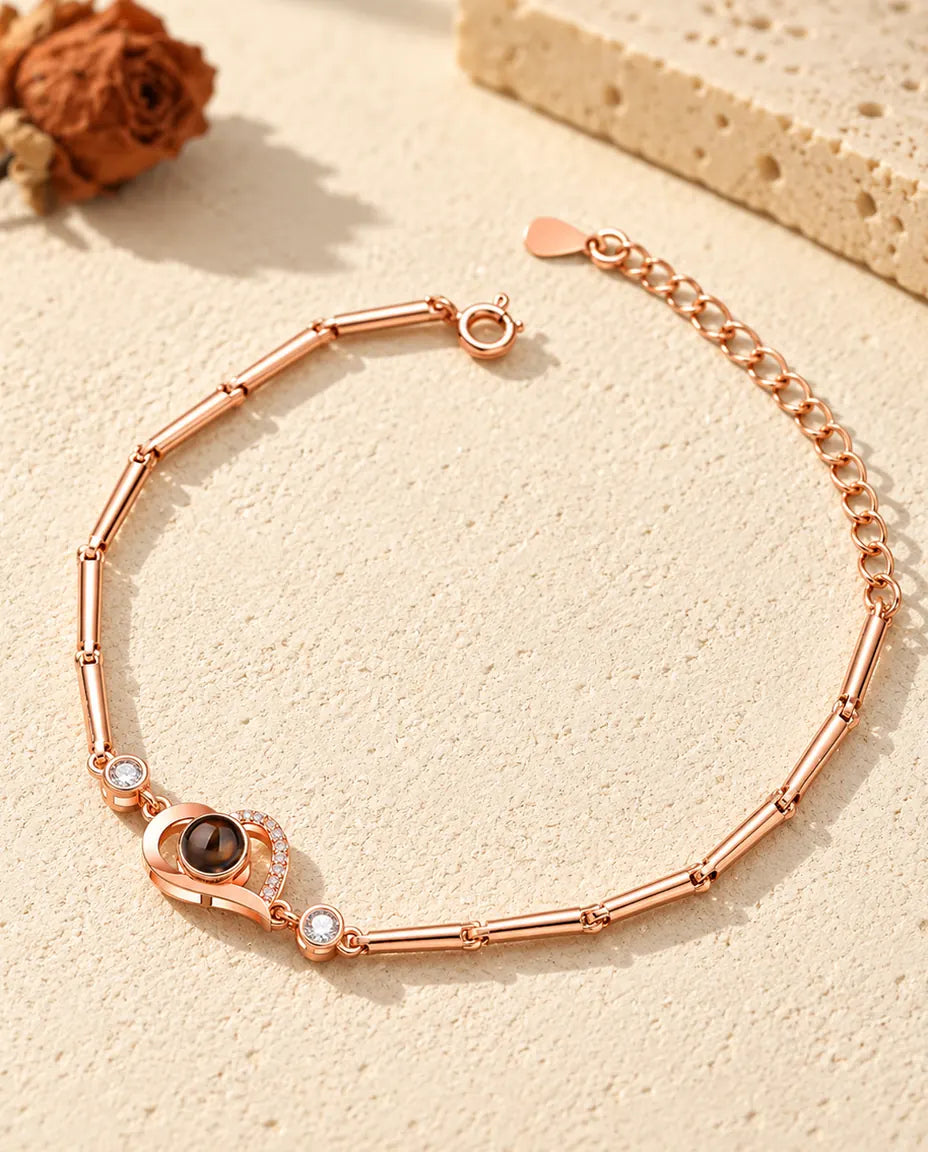Rose gold tone open heart photo projection bracelet with bar chain and extender
