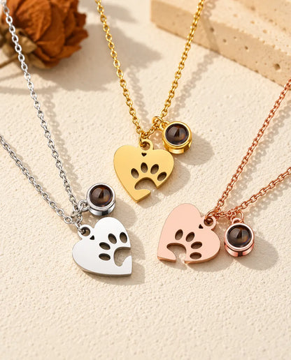 Paw print heart pet necklaces in silver tone, gold tone and rose gold tone with projection charms