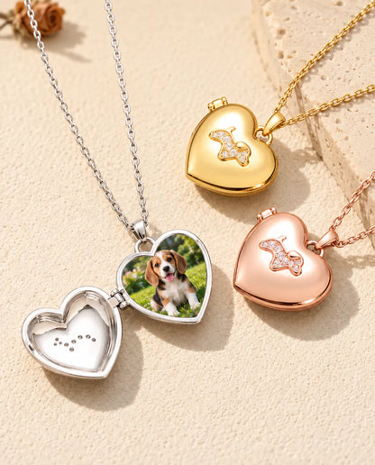 Silver tone puppy heart photo locket opened to show a beagle puppy photo inside, beside closed gold tone and rose gold tone lockets