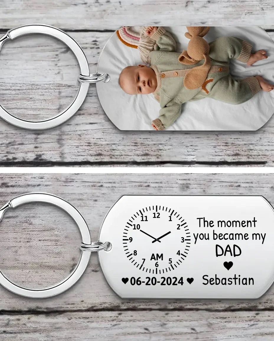 Stainless steel photo keychain with a baby picture printed on the front