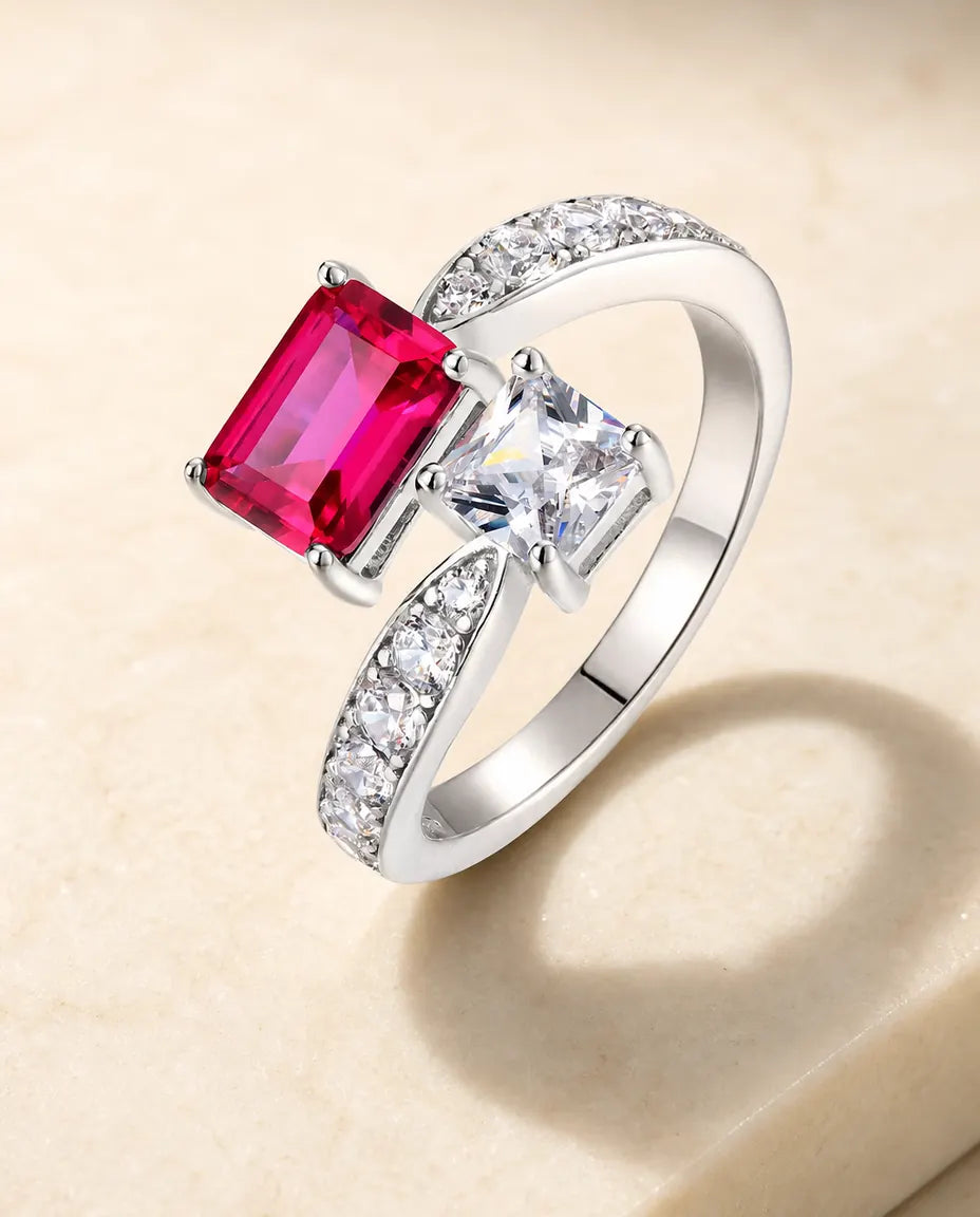 lab-created ruby and white cz toi-et-moi bypass ring in sterling silver, adjustable